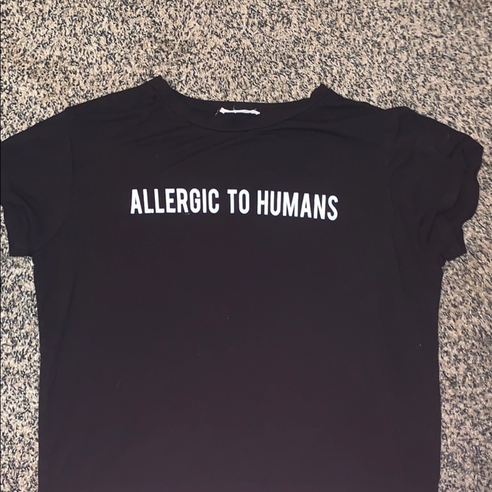 A black shirt with lettering